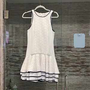 Cream dress with black pipping